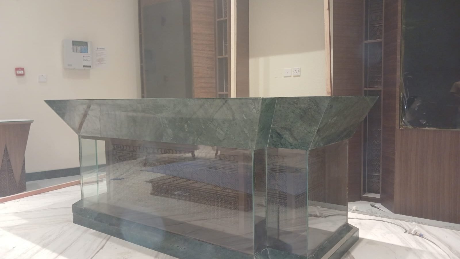 Glass display counter installed during the Arabian Oud retail fit-out in Qatar
