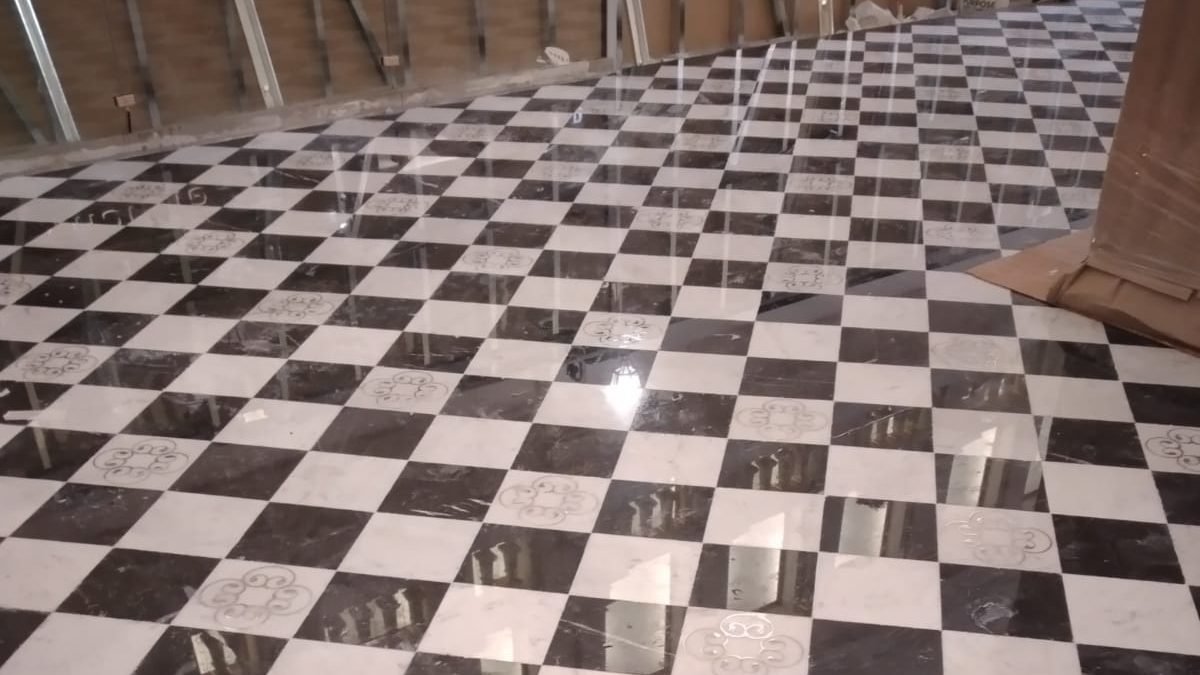 Completed marble chequerboard floor at Bacha Coffee, Villagio Doha