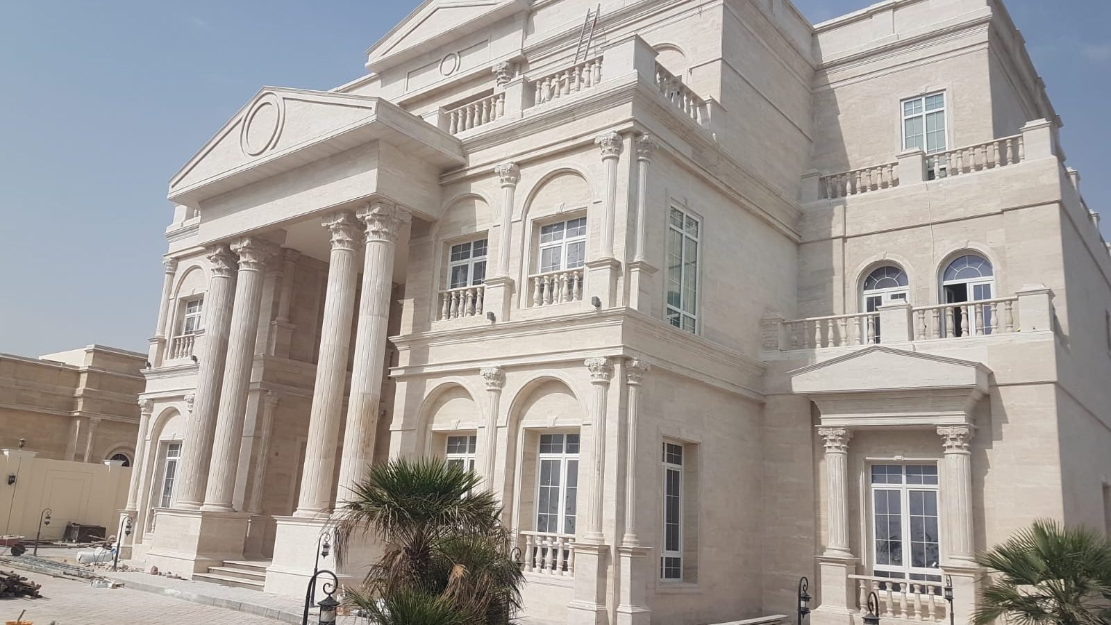Completed private villa with stone facade and balconies at Al Anayze, Qatar