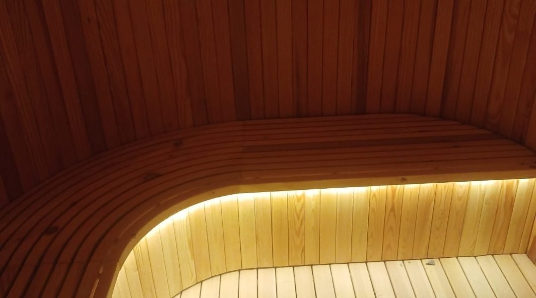 Timber sauna interior with concealed lighting completed at St. Regis Al Mouj Muscat