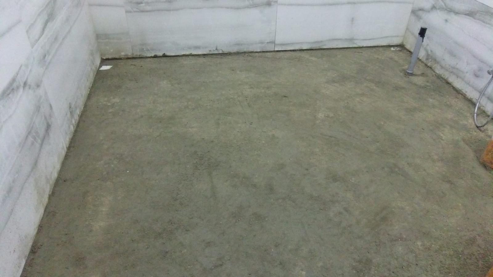 Floor screed laid and levelled ready for marble in Qatar