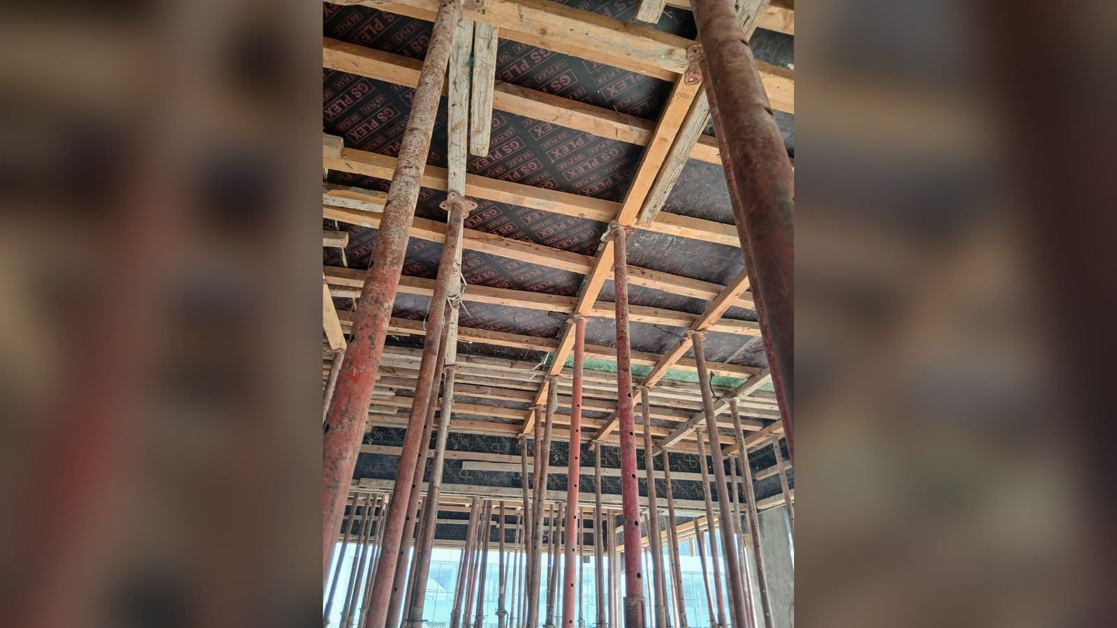 Timber slab formwork and propping on a structural works site in Qatar