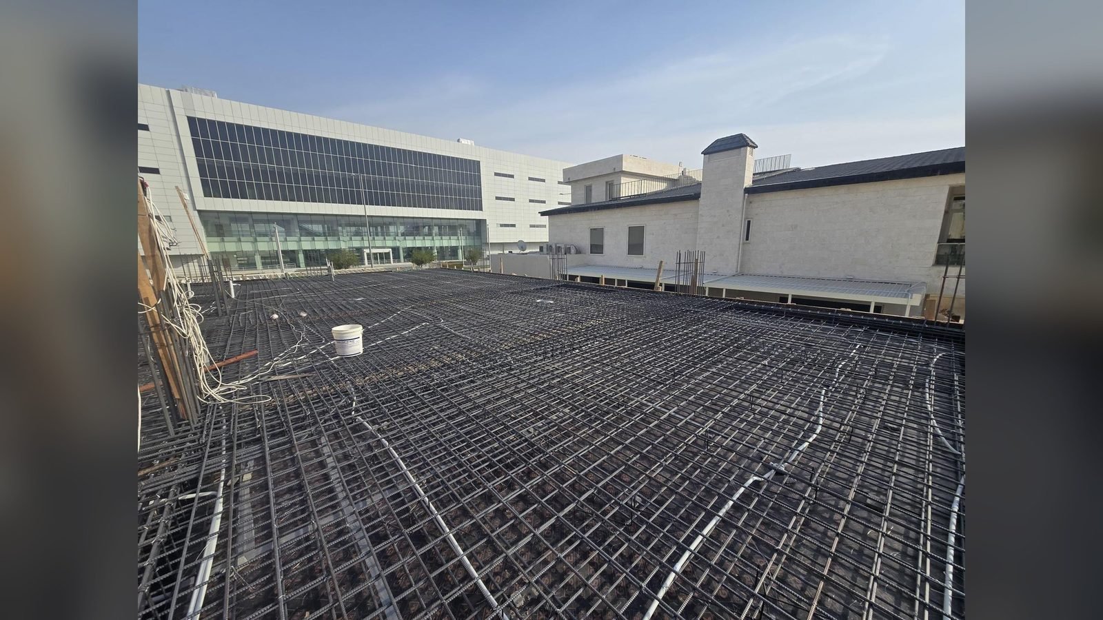 Steel slab reinforcement tied out before a concrete pour in Doha